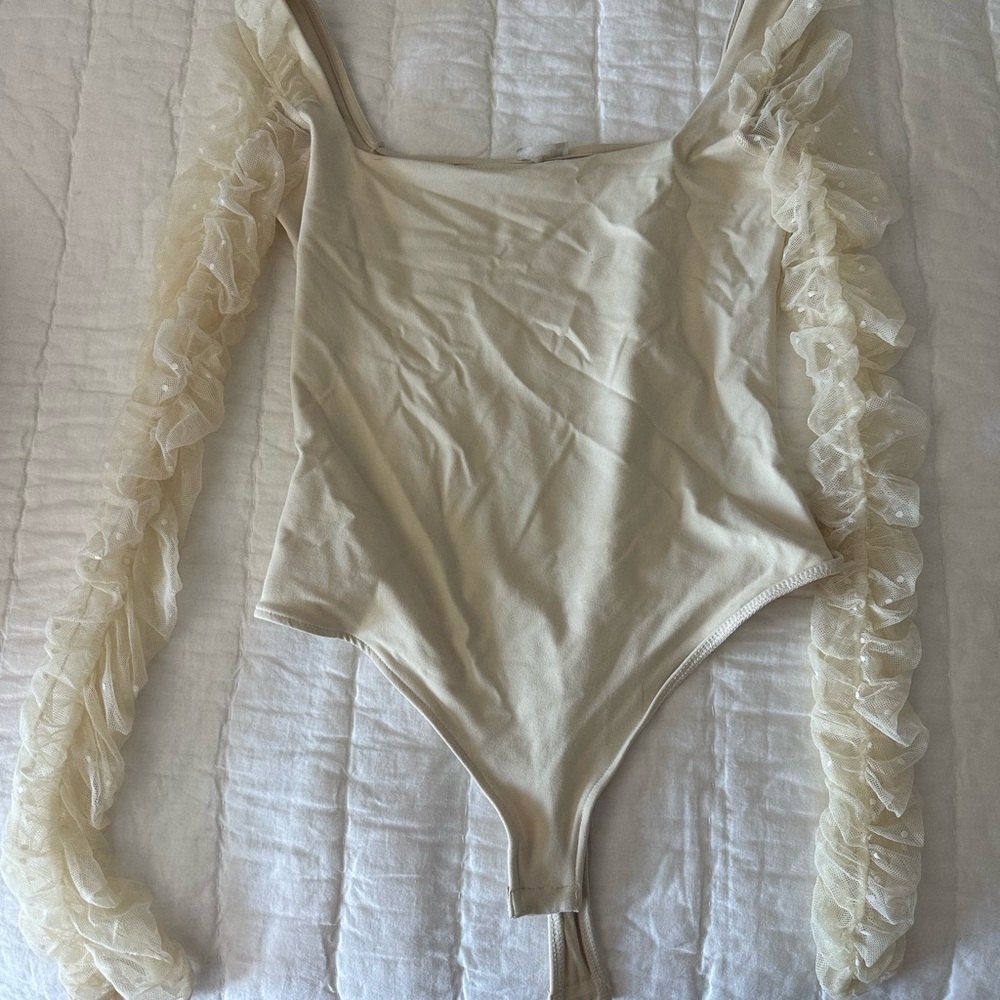 Elegant Cream Bodysuit with Ruffled Sleeves